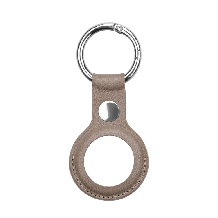 Anti-kras Top-layer koeienhuid lederen case cover met schakelbare sleutelhanger ring voor Apple AirTag (grijs)