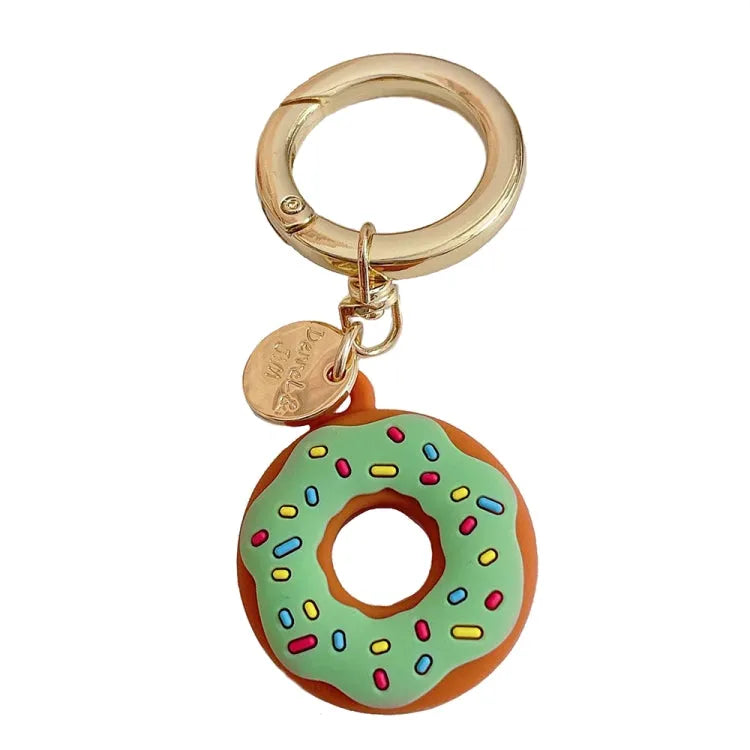 Donut siliconen beschermhoes met metalen gesp voor Apple AirTag (groen)