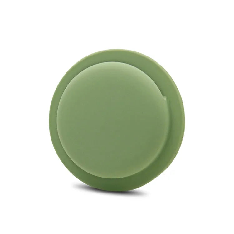 Anti-kras siliconen beschermhoes met plakstrip voor Apple AirTag (groen)