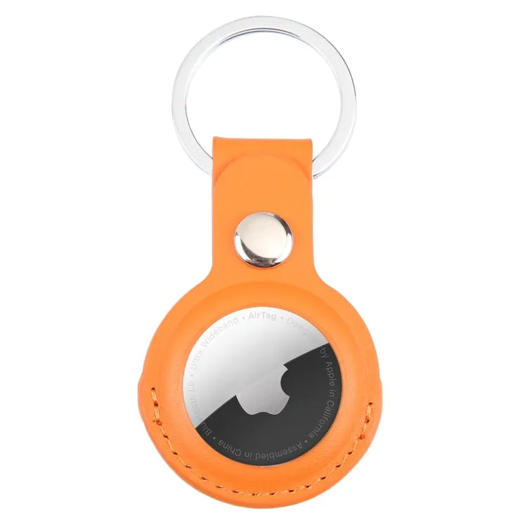 Leren schokbestendige beschermhoes met ophanglus voor Apple AirTag (oranje)