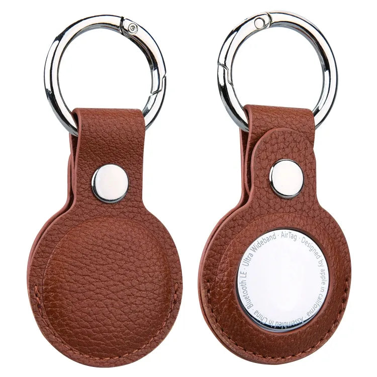 Litchi Texture lederen beschermhoes met sleutelhanger voor Apple AirTag (bruin)